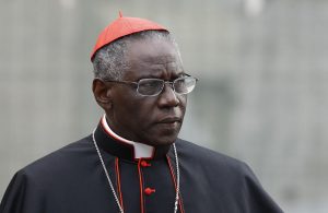 Cardinal Robert Sarah, prefect of the Congregation for Divine Worship and the Sacraments, is pictured at the Vatican in this Oct. 9, 2012, file photo. Cardinal Sarah, the Vatican's liturgy chief, has asked priests to begin celebrating the Eucharist facing east, the same direction the congregation faces. Although not commonplace, the practice is already permitted by church law. Cardinal Sarah made his request during a speech at the Sacra Liturgia conference in London July 5. (CNS photo/Paul Haring) See LITURGY-SARAH-ORIENTUM July 7, 2106.