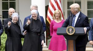 U.S President Donald Trump flanked by religious leaders speaks during a National Day of Prayer Event in the Rose Garden of the White House in Washington, DC, on May 4, 2017. Photo by Olivier Douliery/ Abaca(Sipa via AP Images)