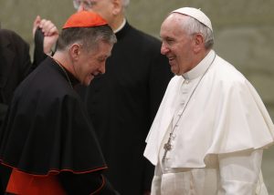 Cardinal Blase J. Cupich of Chicago walks away after meeting Pope Francis during his general audience in Paul VI hall at the Vatican Feb. 7. (CNS photo/Paul Haring) See POPE-AUDIENCE-HOMILY Feb. 7, 2018.