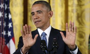 President Obama answers questions during a news conference in the East Room of the White House, one day after Republicans seized control of the U.S. Senate and captured their biggest majority in the House in more than 60 years.